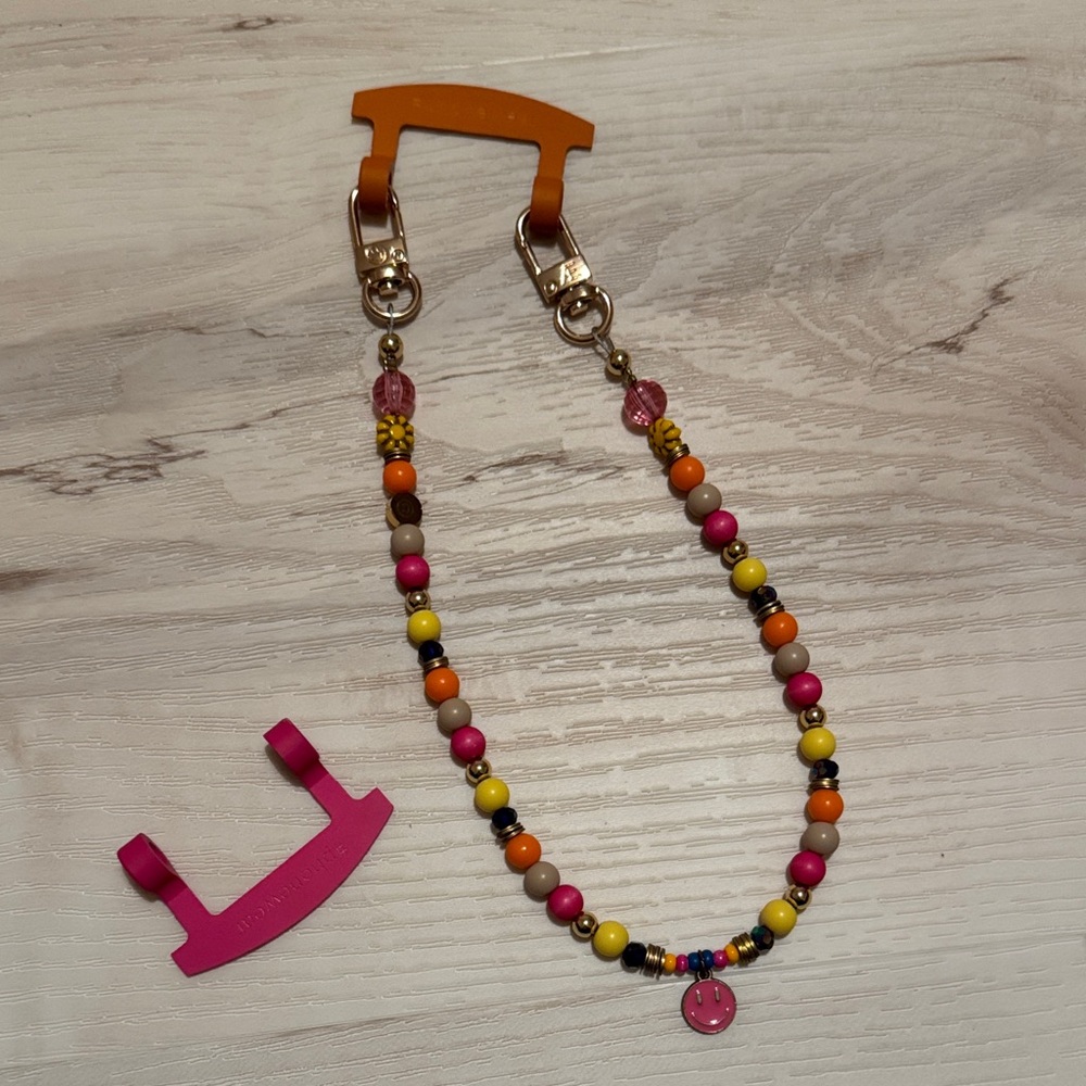 The CAEP beaded phone wristlet
